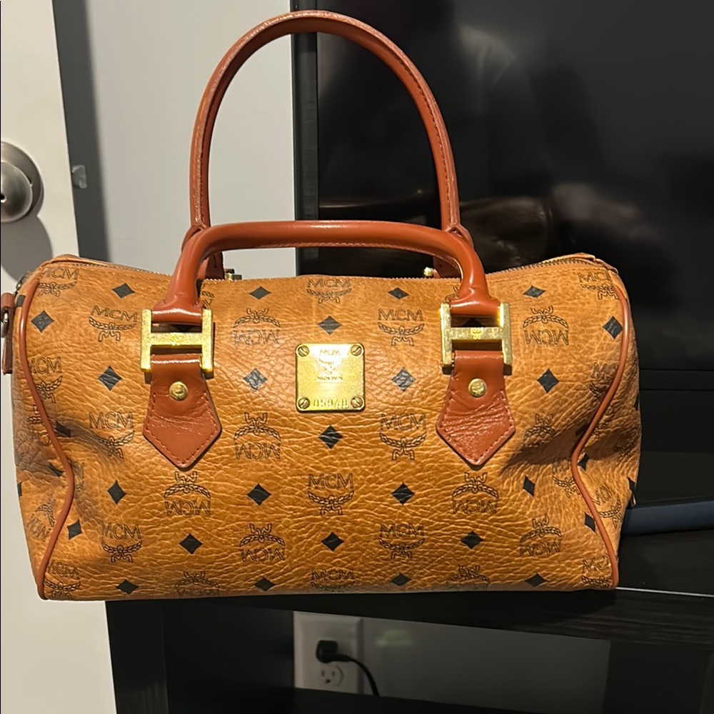MCM Brown Satchel with Iconic Monogram and Gold Hardware